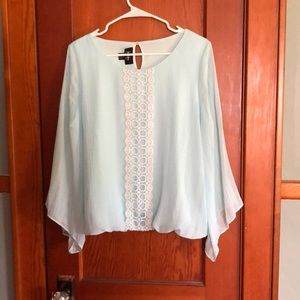 Light blue shirt with white detail